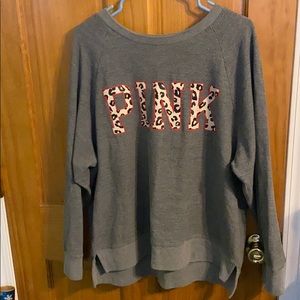 Pink sweater grey with leaped print letters